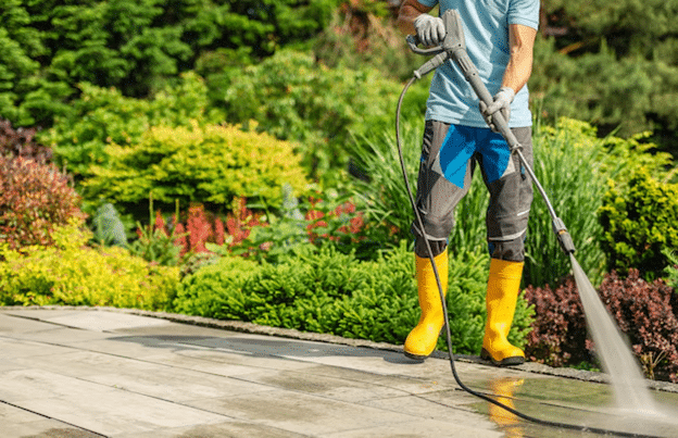 Professional pressure washing of a residential patio in Southampton, restoring paving to a clean, bright finish.